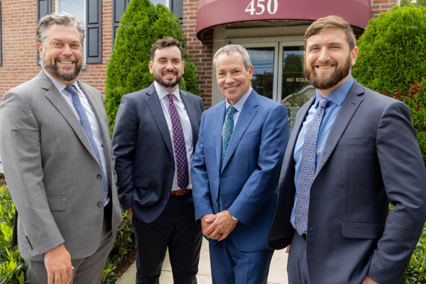 team photo Attorneys (l-r): Andy Milz, Ed Flitter, Cary Flitter, Jody López-Jacobs